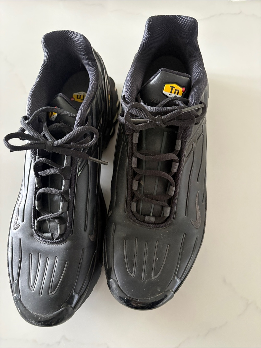 Nike Men’s Black TN Air Max Sneakers with Yellow Accent